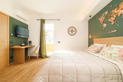 Letto o letti in una camera di In centro da Carlotta