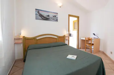 Letto o letti in una camera di CASA IL MAESTRALE