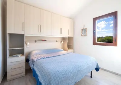 Letto o letti in una camera di CASA SKIPPER