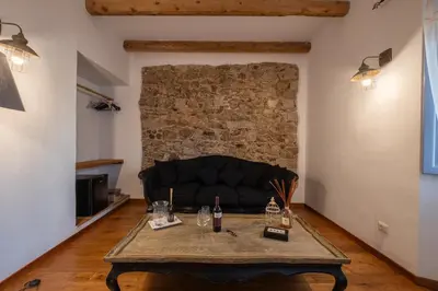 Area soggiorno di Dimoras Stone Suites