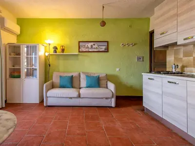 Cucina o angolo cottura di Apartment F4 - F2- Baia de Bahas by Interhome