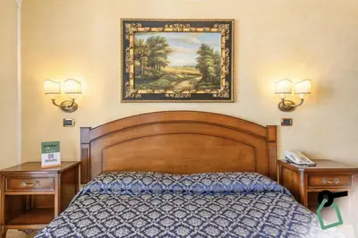 Letto o letti in una camera di Hotiday Olbia Porto