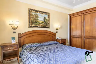 Letto o letti in una camera di Hotiday Olbia Porto