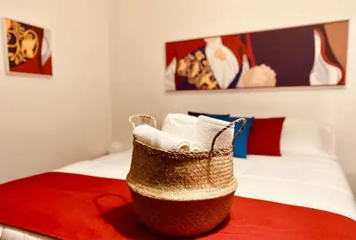 Letto o letti in una camera di Carrales Guest House