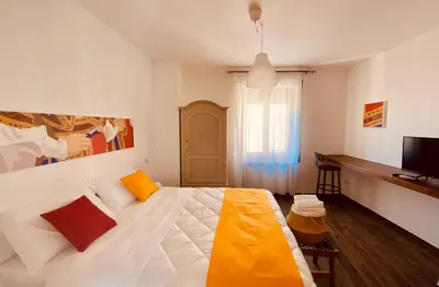 Letto o letti in una camera di Carrales Guest House