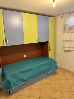 Letto o letti in una camera di Casa Vacanze Padru