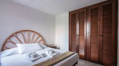 Letto o letti in una camera di Acqua e Tramonto