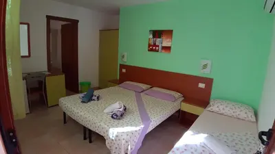 Letto o letti in una camera di Guesthouse Affittacamere Goloritzè