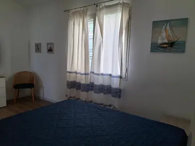 Letto o letti in una camera di Sa Domu de Su Mari
