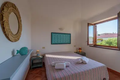 Letto o letti in una camera di Appartamento Figari