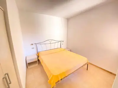 Letto o letti in una camera di Cinta 3
