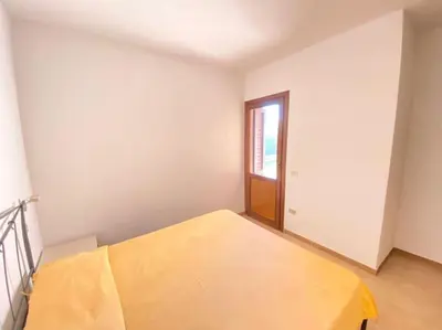 Letto o letti in una camera di Cinta 3