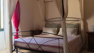 Letto o letti in una camera di Villa Il Casale Onifai