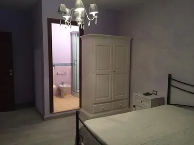 Letto o letti in una camera di Domo Papiros B&B