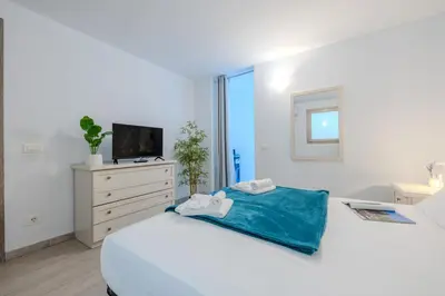 Letto o letti in una camera di Sea View House 6