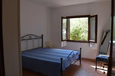 Letto o letti in una camera di B4 Lu Maestrali