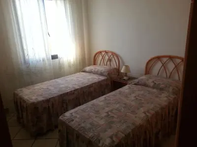 Letto o letti in una camera di F4 Sa Pedra Romantica 1Piano