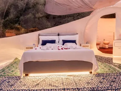 Letto o letti in una camera di Tenuta Lu Baroni