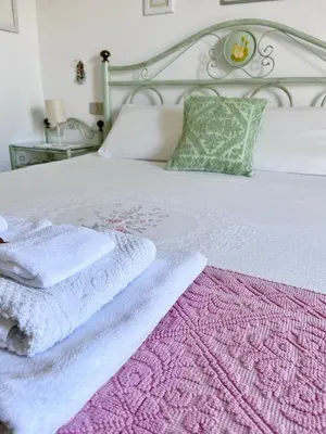 Letto o letti in una camera di Camera Ponente