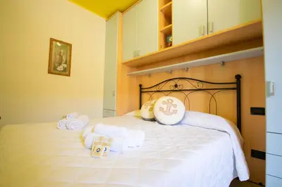 Letto o letti in una camera di La Caletta 1
