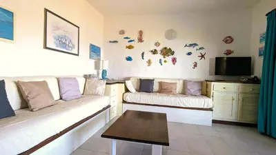 Area soggiorno di Appartamento vista mare a 150m dalla spiaggia
