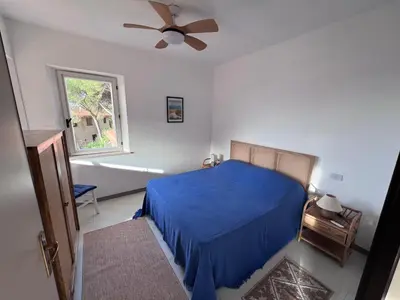 Letto o letti in una camera di Marzy Home