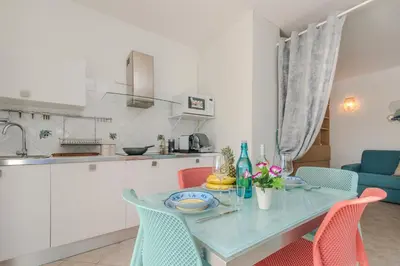 Cucina o angolo cottura di Mono Le Vele 700m From The Beach - Happy Rentals