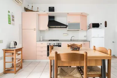 Cucina o angolo cottura di Villetta a schiera 750m SPIAGGIA 600m CENTRO