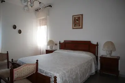 Letto o letti in una camera di Appartamento Via Oristano