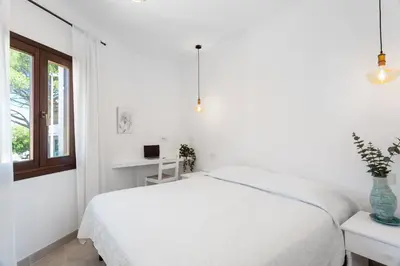 Letto o letti in una camera di Terrazza Pascoli in Golfo Aranci- Sea View Apt!