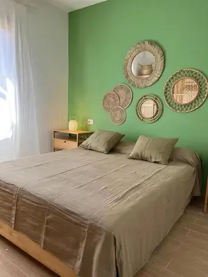 Letto o letti in una camera di Appartamento Pelasgi - Murta Maria
