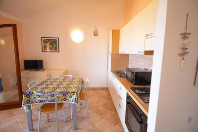 Cucina o angolo cottura di [Olbia 15 minutes] Enchanting sea view