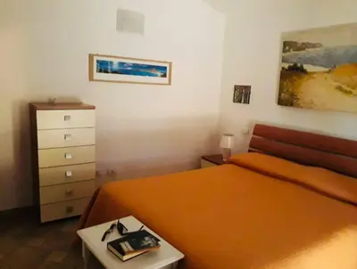 Letto o letti in una camera di Graziosa villetta