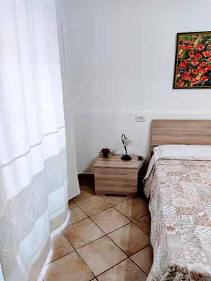 Letto o letti in una camera di Domo Janas Affittacamere Guesthouse