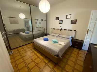 Letto o letti in una camera di A casa da Mari stanza privata Bagno condiviso