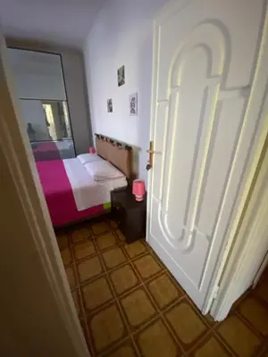 Letto o letti in una camera di A casa da Mari stanza privata Bagno condiviso