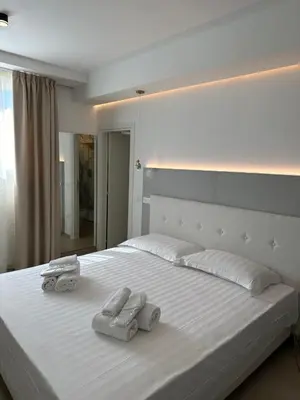 Letto o letti in una camera di Amani Chic Rooms