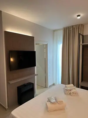 Letto o letti in una camera di Amani Chic Rooms