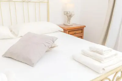 Letto o letti in una camera di Casa delle brezze - A due passi dalla riva