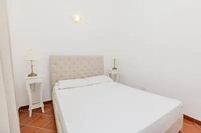 Letto o letti in una camera di Casa delle brezze - A due passi dalla riva