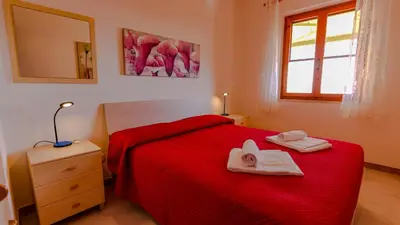 Letto o letti in una camera di Casa Bentu 'E Mare con vista