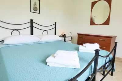 Letto o letti in una camera di La casa di Mariedda