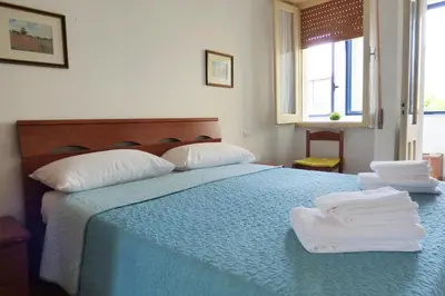 Letto o letti in una camera di La casa di Mariedda