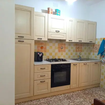 Cucina o angolo cottura di Casa Mary, a pochi passi dal mare IUN R9437