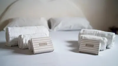 Letto o letti in una camera di Armonia