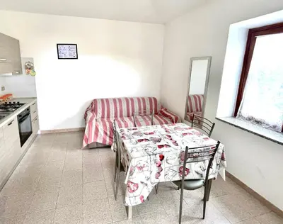 Cucina o angolo cottura di ISS Travel, La Mendula Holiday Home, 2 bedrooms-apartments with private outdoor area