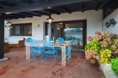 Balcone o terrazza di Appartamento Baia Caddinas fronte mare