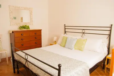 Letto o letti in una camera di Villa Angedras