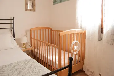 Letto o letti in una camera di Villa Angedras
