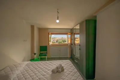 Letto o letti in una camera di La Caletta 4